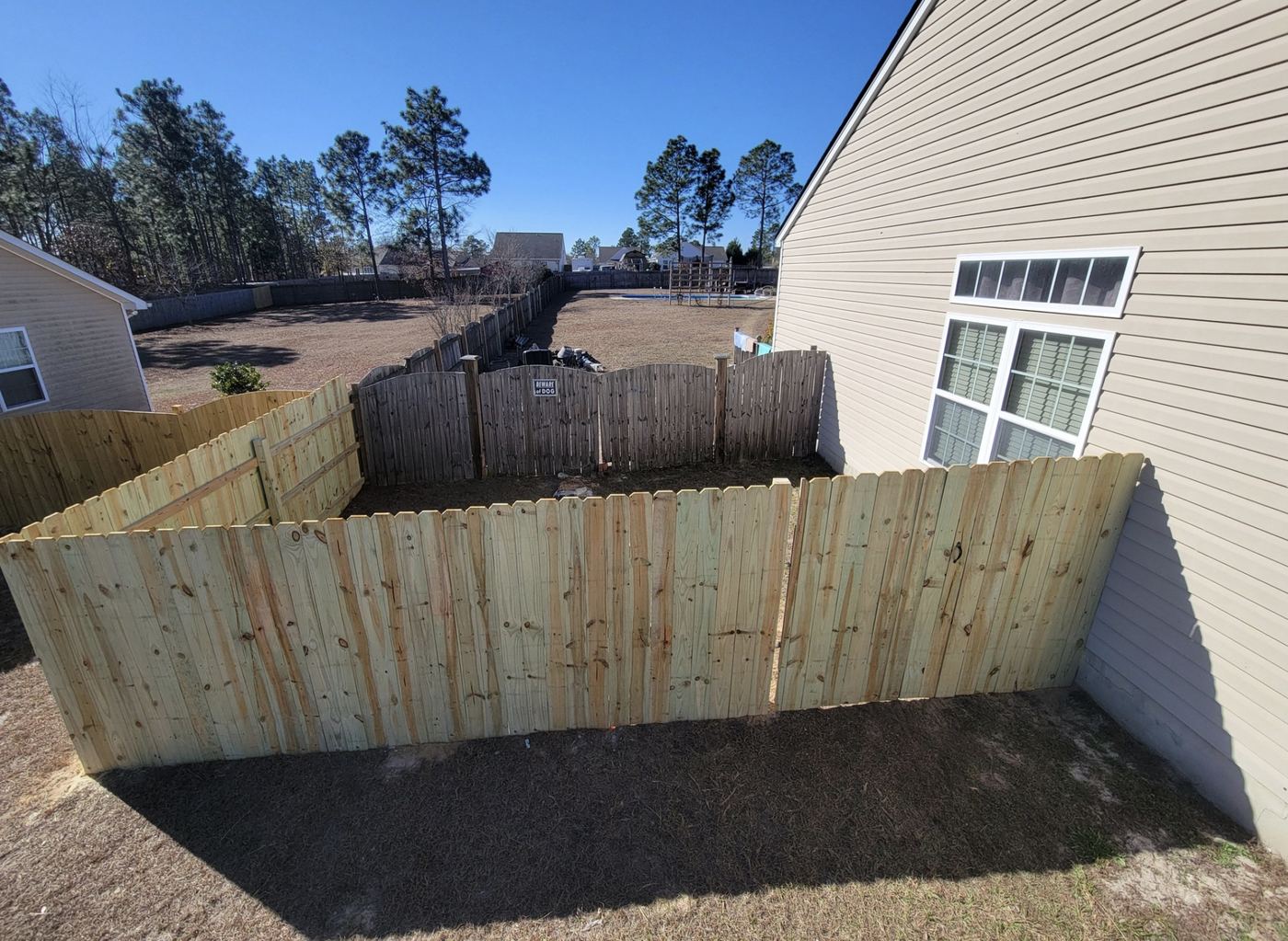 New wood fence installation by MAXXPRO